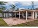 Relaxing backyard oasis with covered patio, gazebo, and hot tub at 2790 Pinellas Point S Dr, St Petersburg, FL 33712