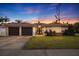Beautiful home with 2-car garage, attractive landscaping, and a welcoming entryway at 2790 Pinellas Point S Dr, St Petersburg, FL 33712