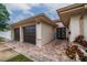House exterior featuring a double-door entry and two-car garage at 2790 Pinellas Point S Dr, St Petersburg, FL 33712