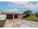Two-car garage and driveway at 2790 Pinellas Point S Dr, St Petersburg, FL 33712
