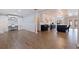 Open concept kitchen boasts modern cabinetry, island, and stainless steel appliances at 2790 Pinellas Point S Dr, St Petersburg, FL 33712
