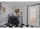 Laundry room with washer, dryer, and stylish black and white checkered floor at 2790 Pinellas Point S Dr, St Petersburg, FL 33712