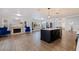 Bright living room with hardwood floors and a fireplace at 2790 Pinellas Point S Dr, St Petersburg, FL 33712