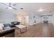 Spacious living room with hardwood floors and built-in workspace at 2790 Pinellas Point S Dr, St Petersburg, FL 33712