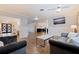 Living room with hardwood floors and views into the kitchen and entry at 2790 Pinellas Point S Dr, St Petersburg, FL 33712