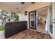 Brick patio with hot tub and access to the interior at 2790 Pinellas Point S Dr, St Petersburg, FL 33712