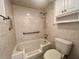 Accessible bathroom featuring a walk-in tub and grab bars at 2991 Flint S Dr # 77-D, Clearwater, FL 33759