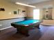 Community game room with pool table at 2991 Flint S Dr # 77-D, Clearwater, FL 33759