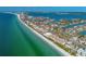 Wide aerial view of coastline and neighborhood at 3100 Gulf Blvd # 424, Belleair Beach, FL 33786