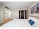 Main bedroom with large closet and en-suite bathroom at 3100 Gulf Blvd # 424, Belleair Beach, FL 33786