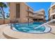 Relaxing community hot tub adjacent to pool at 3100 Gulf Blvd # 424, Belleair Beach, FL 33786