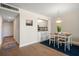 Bright dining area adjacent to kitchen and hallway at 3100 Gulf Blvd # 424, Belleair Beach, FL 33786
