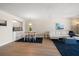 Light and airy living room with dining area and hardwood floors at 3100 Gulf Blvd # 424, Belleair Beach, FL 33786