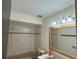 Clean bathroom with tile shower/tub and updated vanity at 3922 Lake Joyce Dr, Land O Lakes, FL 34639