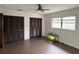 Bedroom with double closets and laminate flooring at 3922 Lake Joyce Dr, Land O Lakes, FL 34639