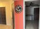 Home entryway with unique wall clock at 3922 Lake Joyce Dr, Land O Lakes, FL 34639