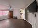 Spacious game room with hardwood floors and access to other areas at 3922 Lake Joyce Dr, Land O Lakes, FL 34639