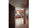 Modern kitchen with wood cabinets and tile floors at 3922 Lake Joyce Dr, Land O Lakes, FL 34639