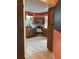 Cozy kitchen with wood cabinets and tile floor at 3922 Lake Joyce Dr, Land O Lakes, FL 34639