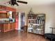 Kitchen area with dark wood cabinets at 3922 Lake Joyce Dr, Land O Lakes, FL 34639