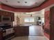 Kitchen with granite countertops and wooden cabinets at 3922 Lake Joyce Dr, Land O Lakes, FL 34639