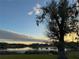 Peaceful lakefront property with scenic sunset views at 3922 Lake Joyce Dr, Land O Lakes, FL 34639