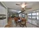 Dining room with a view and access to the patio area at 407 Blackhawk Cir, Sun City Center, FL 33573
