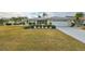 Charming single-story home featuring a well-maintained lawn and tidy landscaping at 407 Blackhawk Cir, Sun City Center, FL 33573