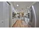 Modern kitchen features stainless steel appliances and lots of white cabinets at 407 Blackhawk Cir, Sun City Center, FL 33573