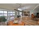An open floor plan showing the spacious living room, water views and dining area at 407 Blackhawk Cir, Sun City Center, FL 33573