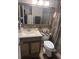 Bathroom with updated vanity and toilet at 515 Cottage Ln, Brandon, FL 33510