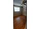 Bedroom with wood-look flooring and ceiling fan at 515 Cottage Ln, Brandon, FL 33510