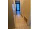 Hallway with tile flooring and access to other rooms at 515 Cottage Ln, Brandon, FL 33510
