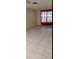 Spacious living room featuring tile flooring and large windows at 515 Cottage Ln, Brandon, FL 33510