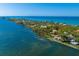 Waterfront property with private dock and lush surroundings at 6119 Gnarled Oak Ln, Englewood, FL 34223