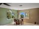 Small breakfast nook with water views and seating for four at 6119 Gnarled Oak Ln, Englewood, FL 34223