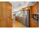 Modern kitchen with stainless steel appliances and granite countertops at 6119 Gnarled Oak Ln, Englewood, FL 34223