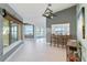 Kitchen with island, barstools, and water views at 6119 Gnarled Oak Ln, Englewood, FL 34223