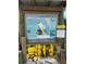 Manasota Beach Park life jacket loaner station with park information and map at 6119 Gnarled Oak Ln, Englewood, FL 34223