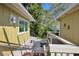 Stairs leading down to a waterfront walkway at 6119 Gnarled Oak Ln, Englewood, FL 34223