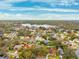 Aerial view of houses near lake at 15106 Meadowlake St, Odessa, FL 33556