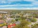 Aerial view of neighborhood near lake at 15106 Meadowlake St, Odessa, FL 33556