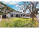 Spacious backyard with a large pool and lush lawn at 15106 Meadowlake St, Odessa, FL 33556