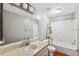 Bathroom with tub, shower, and single vanity at 15106 Meadowlake St, Odessa, FL 33556
