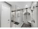 Bathroom with double vanity and large walk-in shower at 15106 Meadowlake St, Odessa, FL 33556