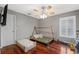 Bright bedroom with hardwood floors and a teepee bed at 15106 Meadowlake St, Odessa, FL 33556