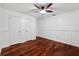 Bright bedroom with hardwood floors and double closets at 15106 Meadowlake St, Odessa, FL 33556