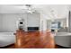 Hardwood floors, vaulted ceilings, and access to the backyard at 15106 Meadowlake St, Odessa, FL 33556