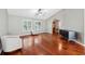 Hardwood floors, vaulted ceilings, and access to the backyard at 15106 Meadowlake St, Odessa, FL 33556