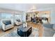 Cozy living room with abundant natural light and a glimpse of the dining area at 1720 Flamingo Ln, Sun City Center, FL 33573